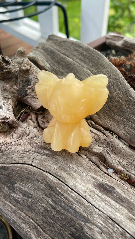 Yellow Calcite Stitch Crystal Carving