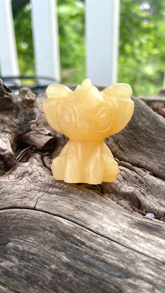 Yellow Calcite Stitch Crystal Carving